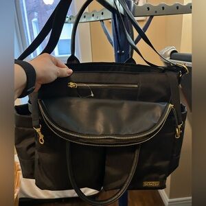 Skip hop diaper bag.